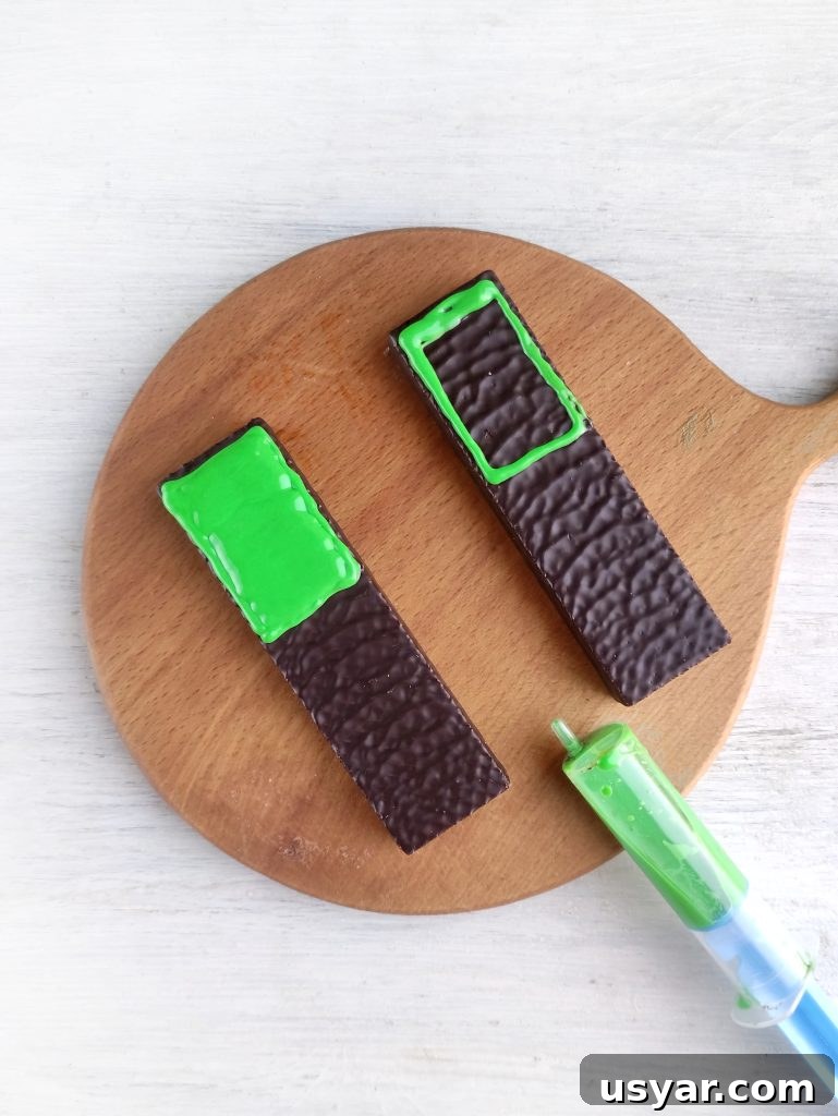 How to Make Frankenstein Chocolate Bars for Halloween 5 Filled green face section on chocolate bar