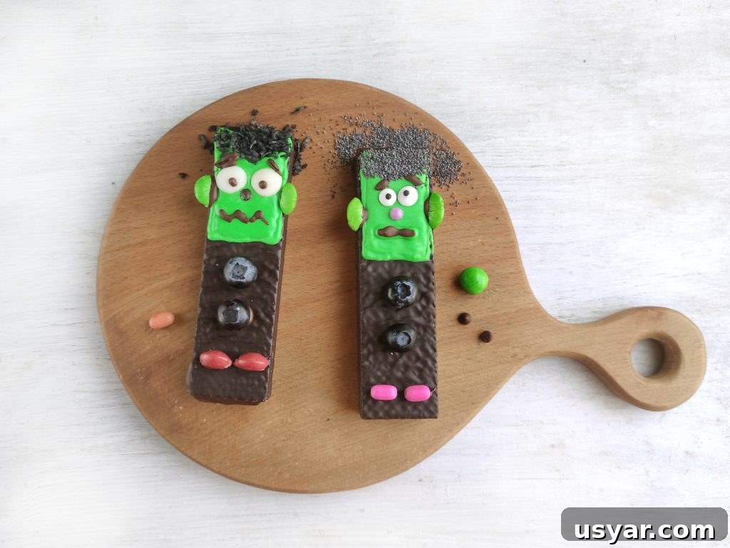 How to Make Frankenstein Chocolate Bars for Halloween 7 Drawing facial details on Frankenstein bars