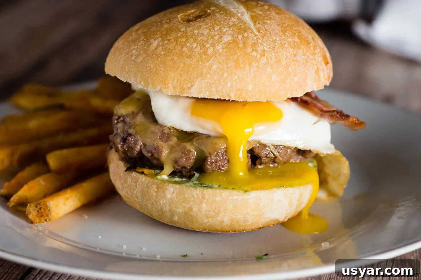 French Bistro Burgers with Gruyère and Dijon 4 French Bistro Burgers served with melted Gouda and a sunny-side-up egg