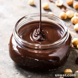 Pouring paleo and keto Nutella hazelnut spread