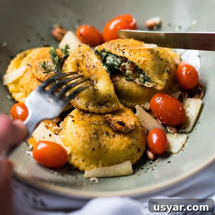 Cutting a keto ravioli with a knife and fork