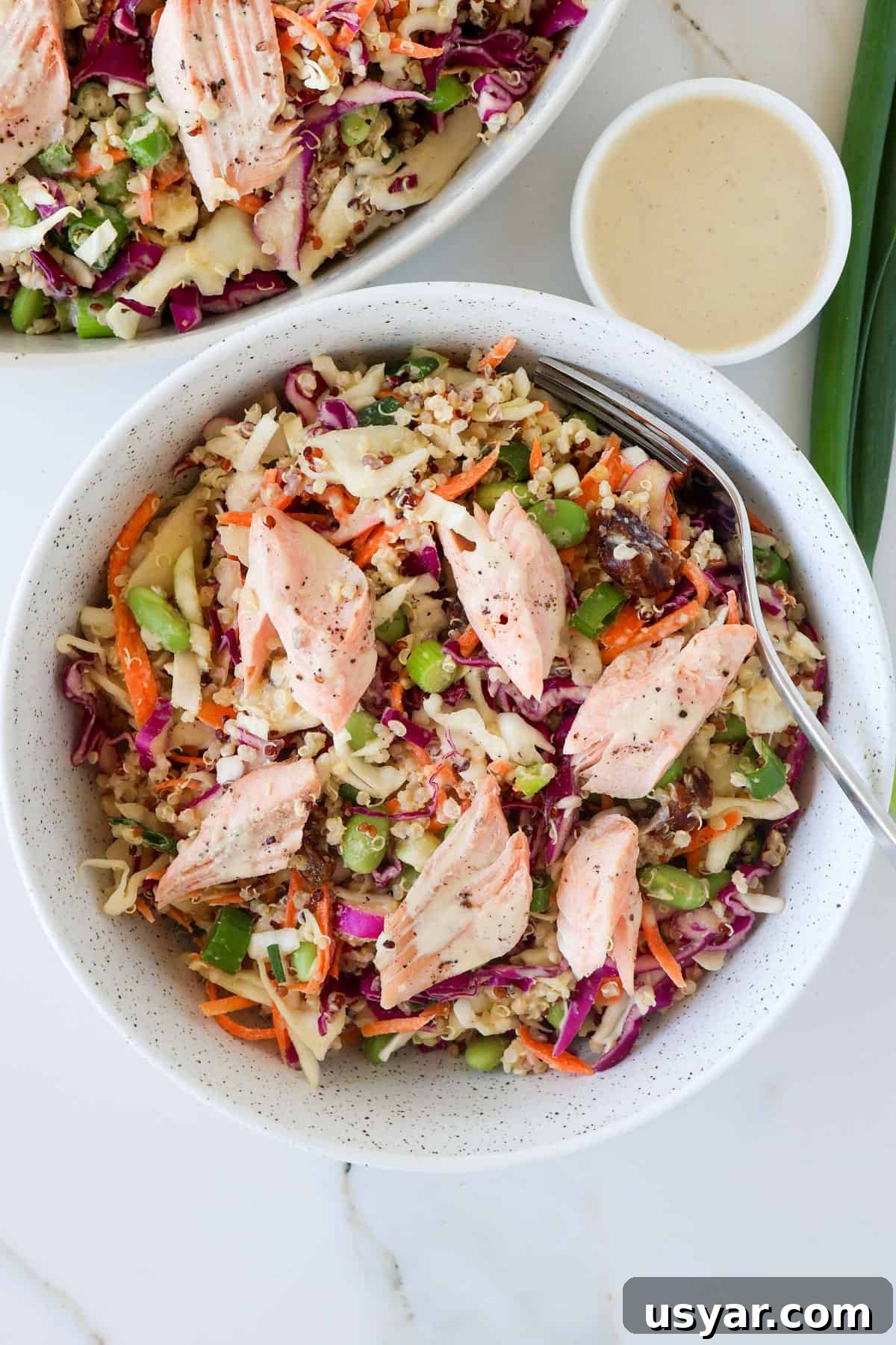 Smoked Trout and Edamame Salad with Lemon Dressing 8 Trout salad in a serving bowl with a fork.