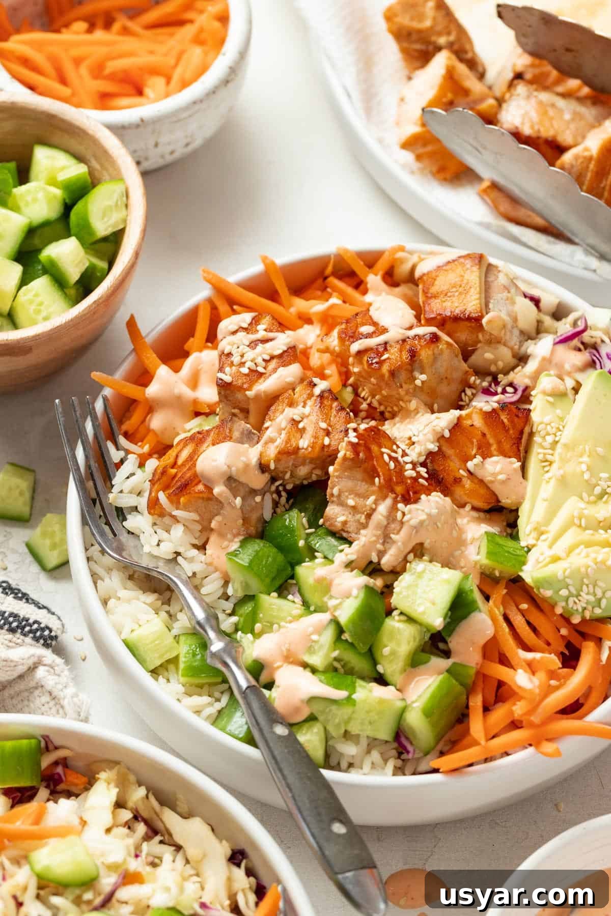 Spicy Mayo Salmon Rice Bowl 10 Drizzling spicy mayo sauce on top of the salmon bowls.