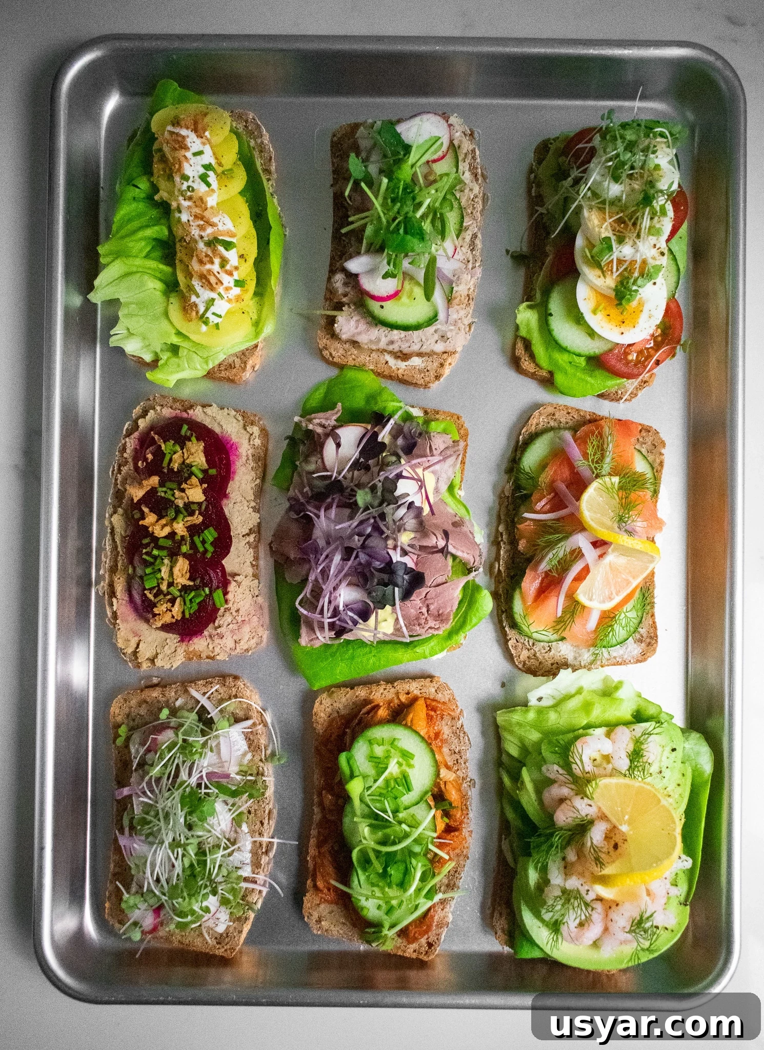 Danish open faced sandwiches on a platter.