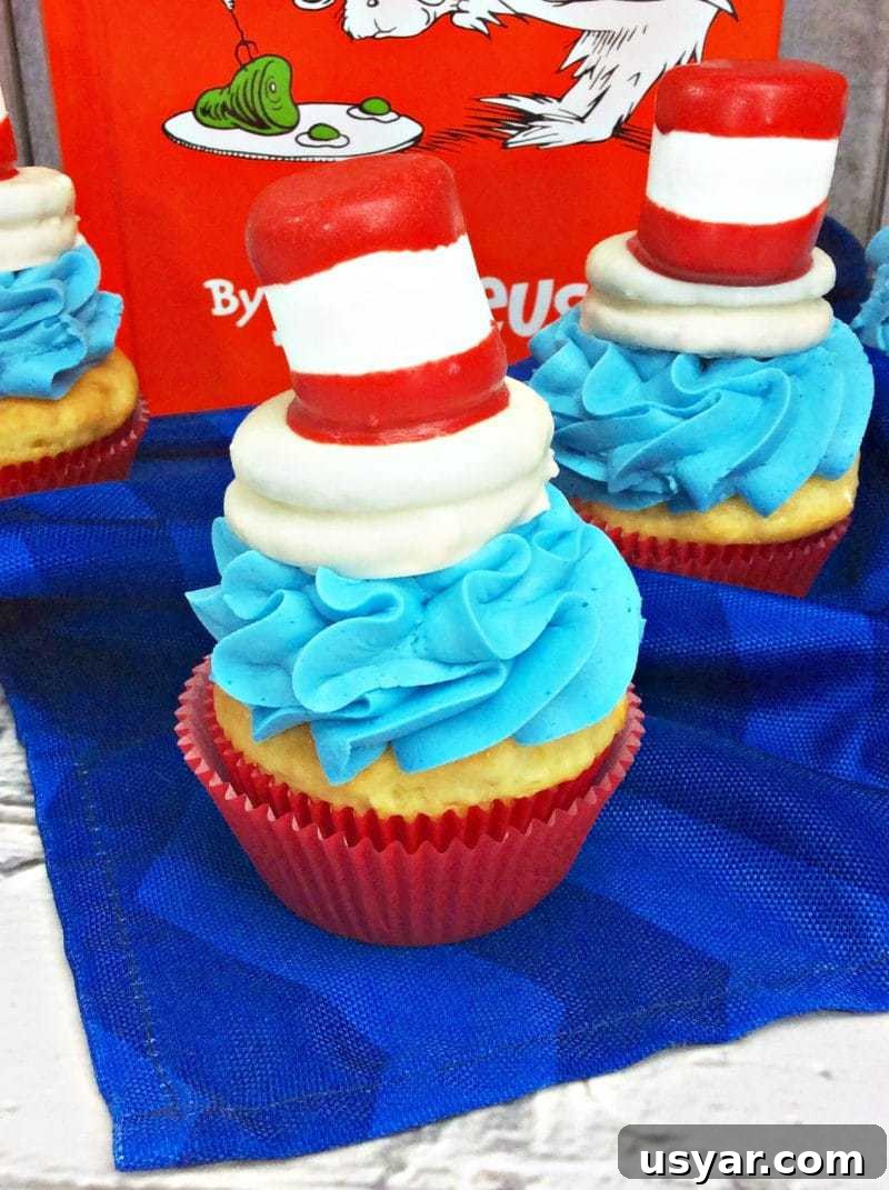 Cat in the Hat Cupcakes for Dr. Seuss Day Party 3 Cat in the Hat cupcakes are the perfect treat to make for a Dr. Seuss Day party or Dr. Seuss birthday party. Made using boxed cake mix and premade frosting, the only thing you really need to spend time on is the fun Cat and the Hat topper that sits on top of the cupcakes!