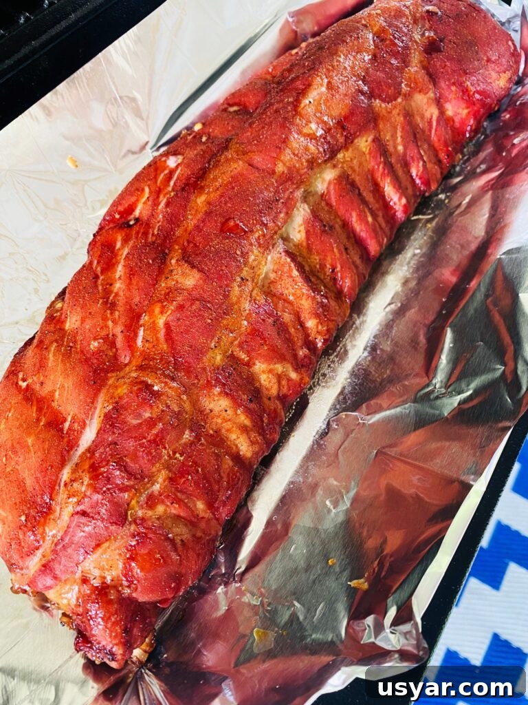 Smoked Ribs with Cherry Coke Glaze 5 wrapping ribs in foil