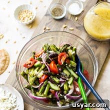Charred Grilled Asparagus Salad with Lemon Vinaigrette 8 Overhead photo of glass bowl filled with grilled asparagus salad