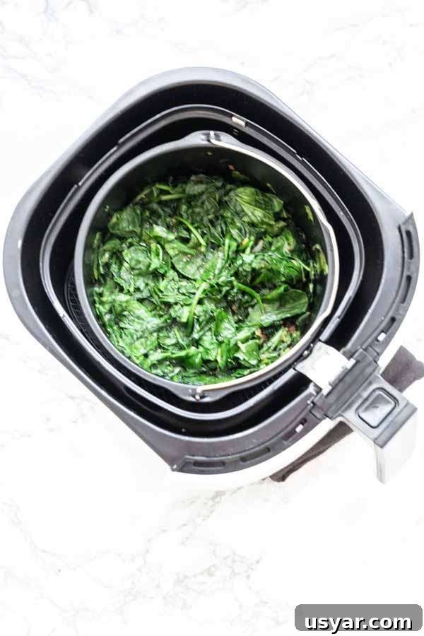 Crispy Garlic Air Fryer Spinach 5 Spinach made with an Air Fryer barrel and using fresh spinach. No butter is needed.