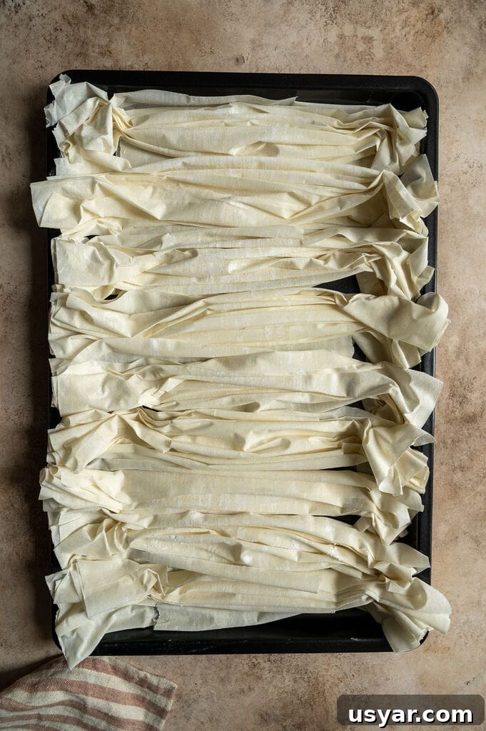 Lemonopita: Greek Lemon Cake with Phyllo 7 Preparing the phyllo to bake to dry it out.