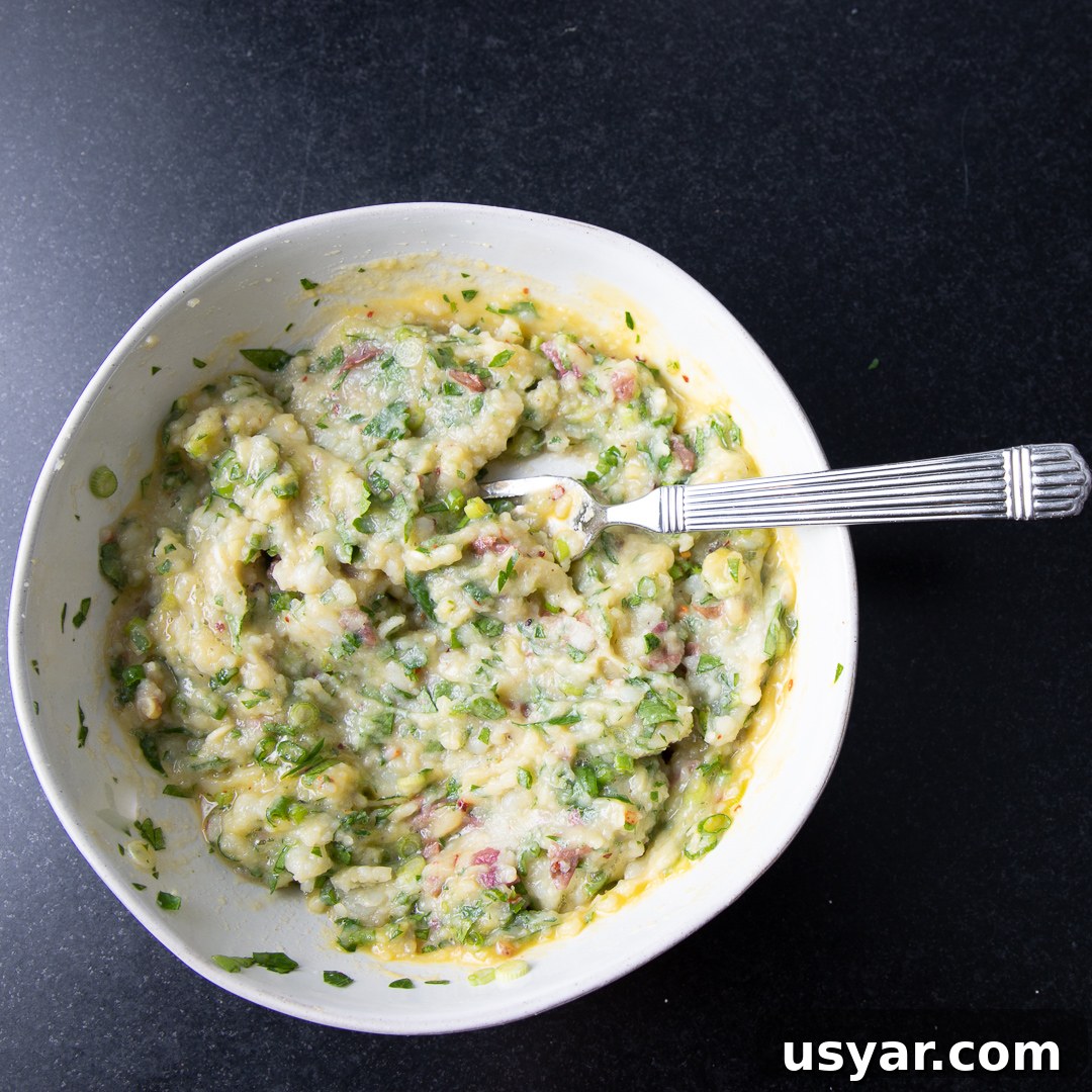 Crispy Leftover Mashed Potato Waffles 5 Batter for mashed potato waffles. Loaded with chopped greens.