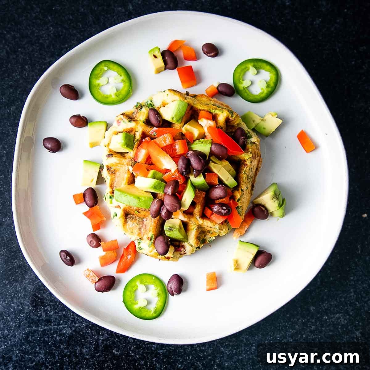 Crispy Leftover Mashed Potato Waffles 9 Savory waffle loaded with toppings like jalapeno slices, black beans, avocado, chopped bell peppers.