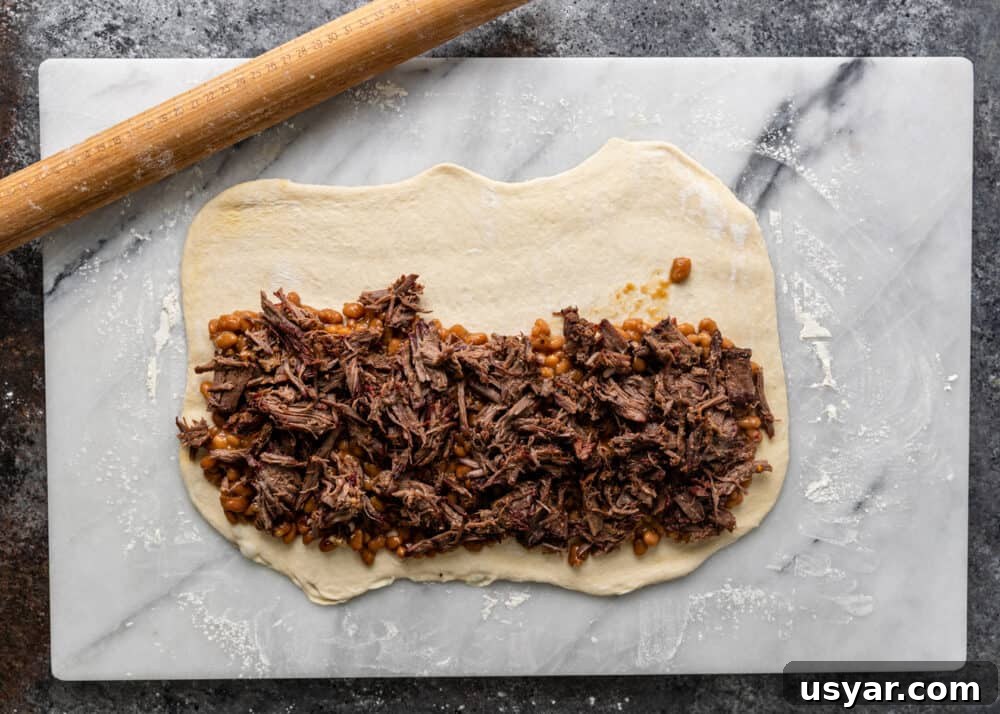 shredded bbq beef added to dough