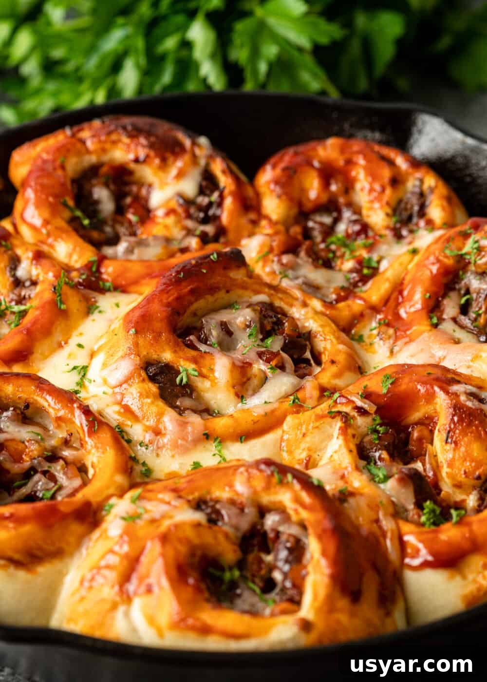 pan with cooked bbq beef rolls